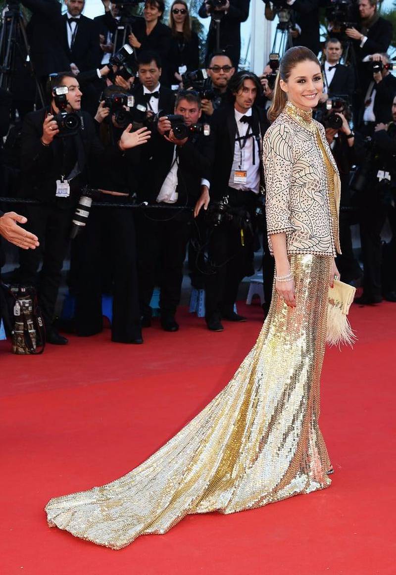 Olivia Palermo wore a golden Roberto Cavalli gown and jacket in 2013. EPA