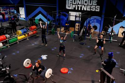 People attend a strength and conditioning class at Ultimate Fitness Gym in Wallsend, north-east England. Reuters
