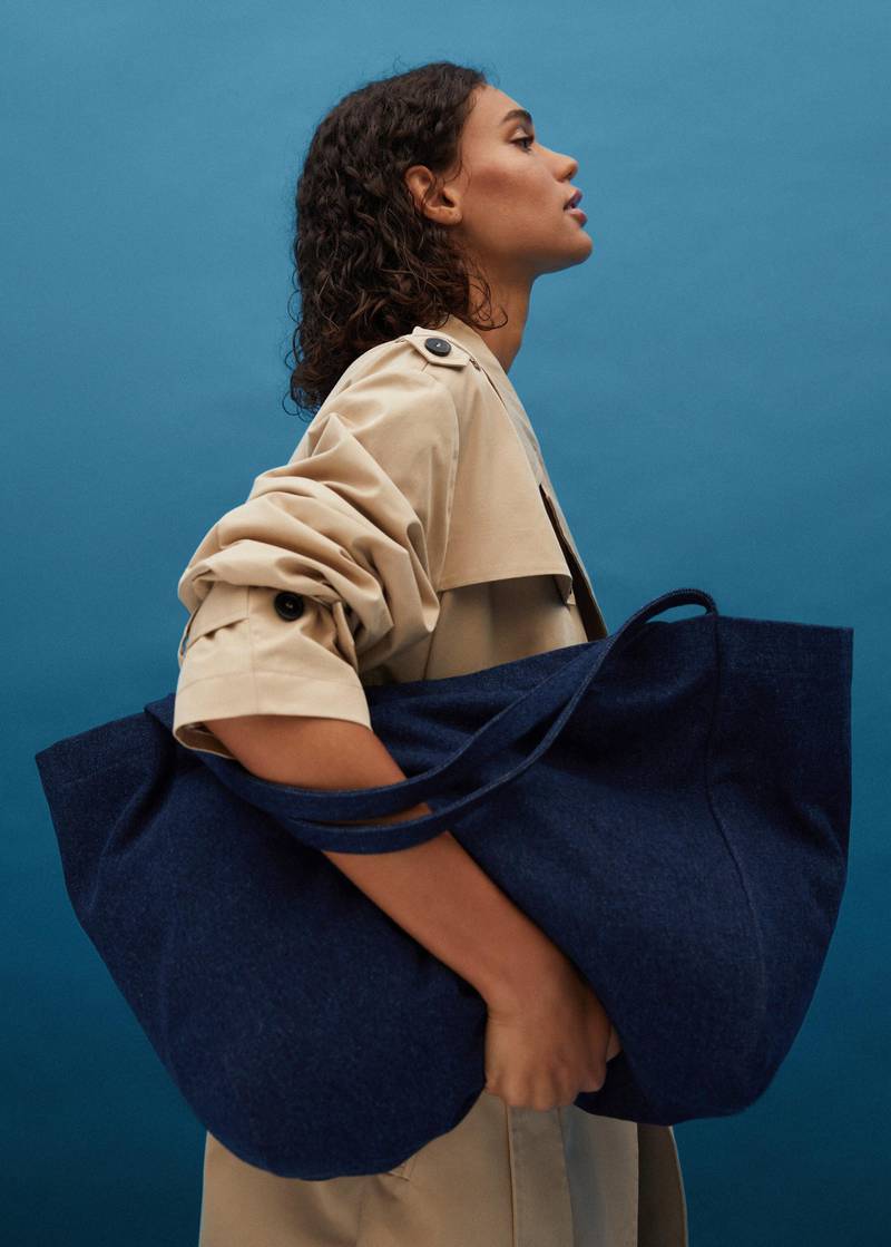 An oversized denim shopper from Mango's Upcycled Accessories collection