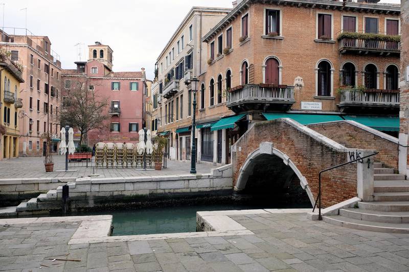 A square is seen virtually deserted in Venice as the Italian government continues restrictive movement measures to combat the coronavirus outbreak, in Venice, Italy, March 14, 2020. REUTERS/Manuel Silvestri