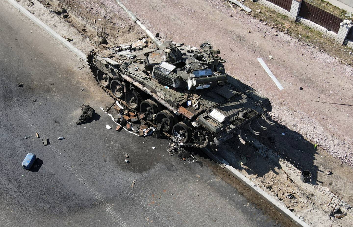A charred Russian tank is seen on the front line in the Kyiv region, on March 20, 2022.  Reuters