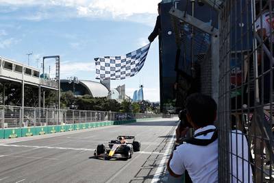 Red Bull's Dutch driver Max Verstappen wins the Azerbaijan Grand Prix at the Baku City Circuit on June 12, 2022. AFP