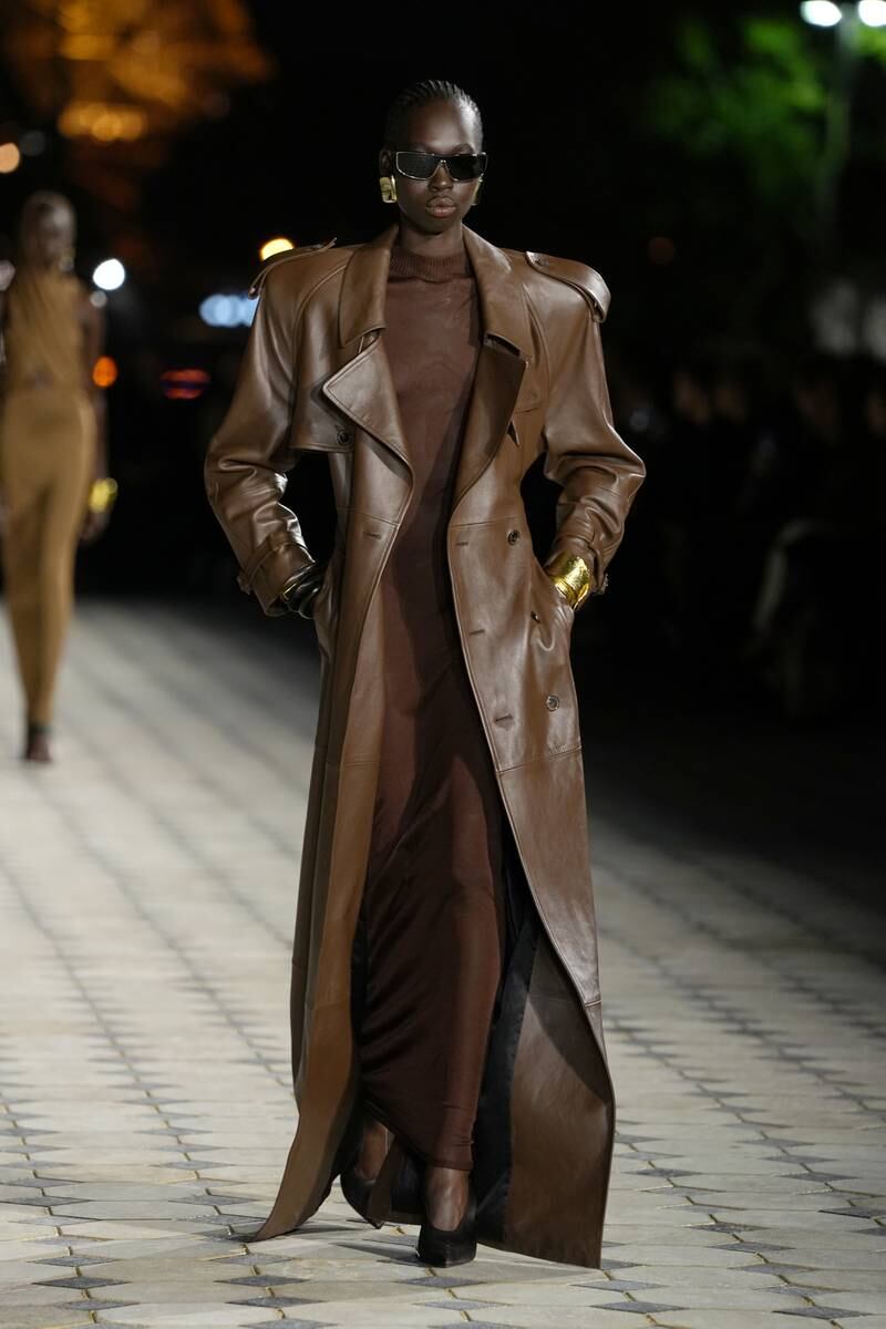 A floor-length leather coat. Getty Images