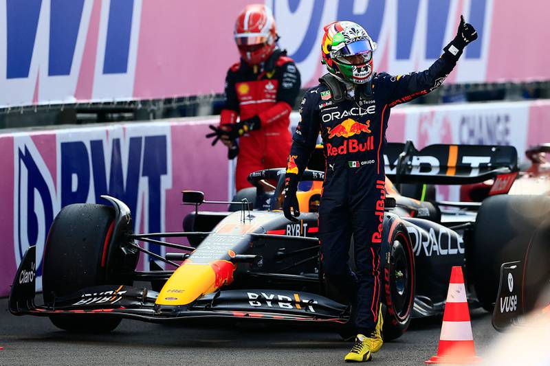 Red Bull Racing driver Sergio Perez gives the thumb up after obtaining fourth place in qualifying for the Mexico Grand Prix. AFP