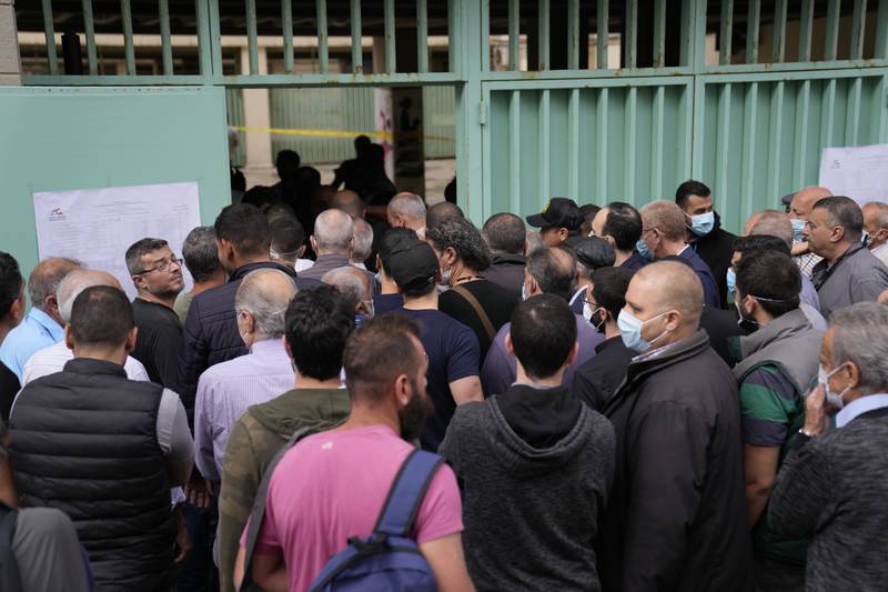 People line up to vote at a polling station in Beirut. AP