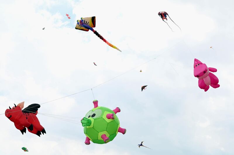 Kites fly over Marina Barrage in Singapore. AFP
