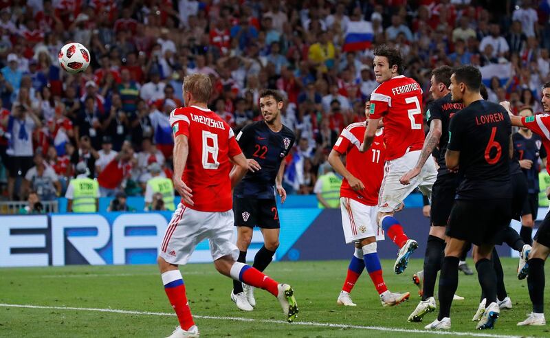 Russia's Mario Fernandes scores his side' second goal, bringing the scores level at 2-2. Manu Fernandez/AP Photo