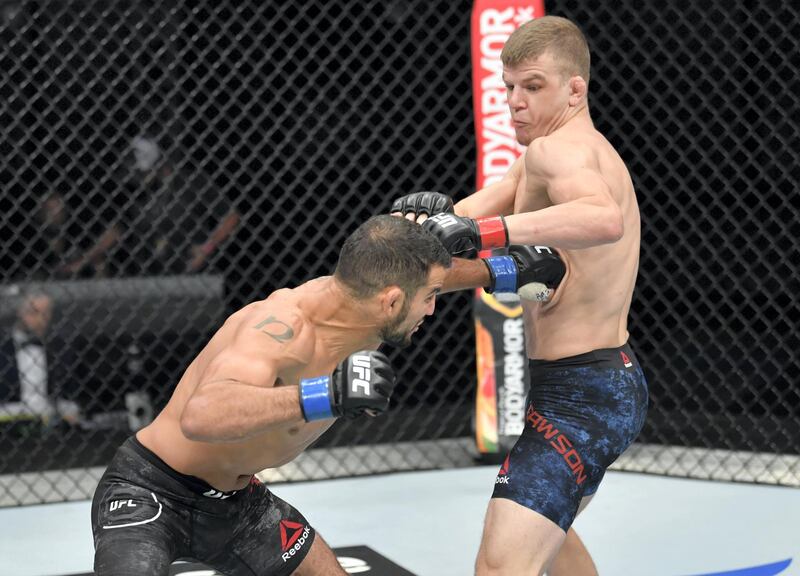 ABU DHABI, UNITED ARAB EMIRATES - JULY 19: Nad Narimani of England punches the body of Grant Dawson in their bout during the UFC Fight Night event inside Flash Forum on UFC Fight Island on July 19, 2020 in Yas Island, Abu Dhabi, United Arab Emirates. (Photo by Jeff Bottari/Zuffa LLC via Getty Images) *** Local Caption *** ABU DHABI, UNITED ARAB EMIRATES - JULY 19: Nad Narimani of England punches the body of Grant Dawson in their bout during the UFC Fight Night event inside Flash Forum on UFC Fight Island on July 19, 2020 in Yas Island, Abu Dhabi, United Arab Emirates. (Photo by Jeff Bottari/Zuffa LLC via Getty Images)