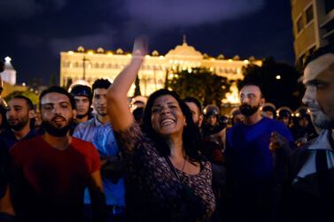 Protesters shout anti-government slogans during a demonstration in front of the Government Palace in central Beirut. EPA