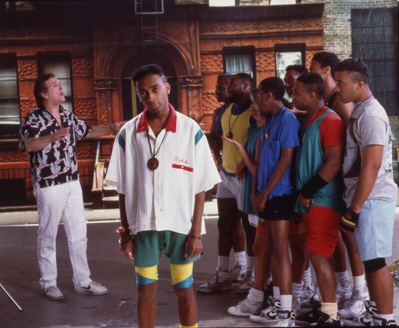 Portrait of American film director and actor Spike Lee (center) on the set of his film 'Do the Right Thing,' New York, 1989. Among the cast behind him is actor Danny Aiello (left). (Photo by Anthony Barboza/Getty Images)