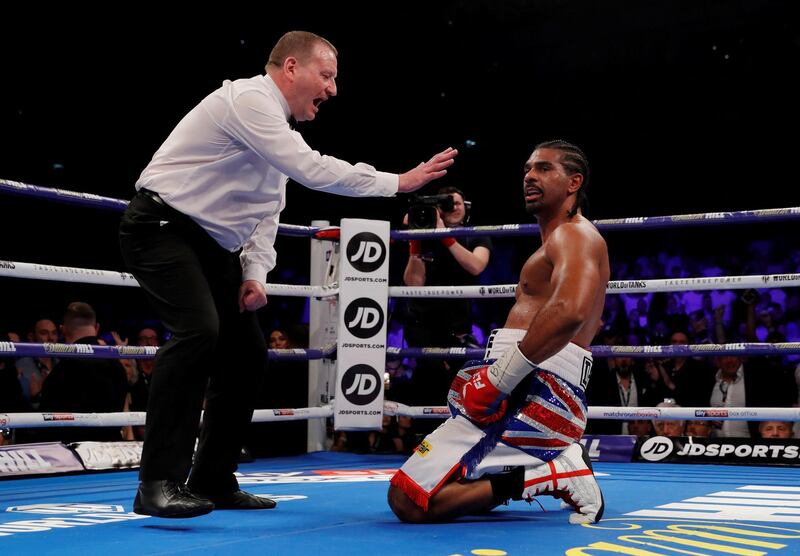 David Haye looks on as he is given a count by the referee. Andrew Couldridge / Reuters