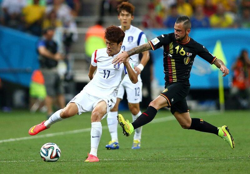 Lee Chung-Yongof South Korea shown just before he is fouled by Steven Defour of Belgium, resulting in a red card for Defour, during their match on Thursday at the 2014 World Cup in Sao Paulo, Brazil. Clive Brunskill / Getty Images