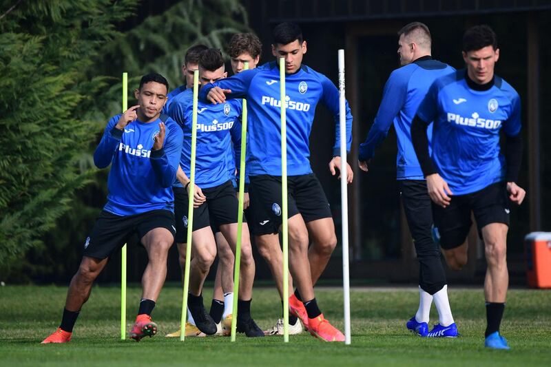 Atalanta players during training. AFP