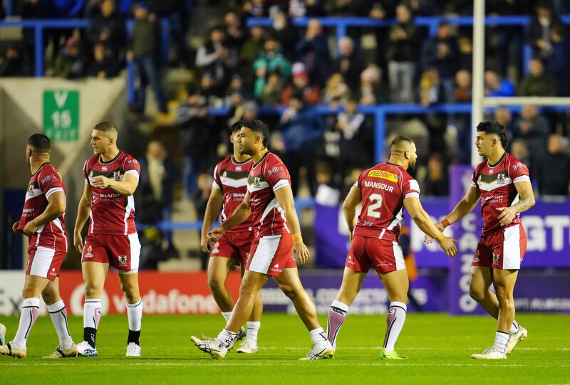 Lebanon's Josh Mansour, second from right, celebrates after scoring a try.  AP Photo