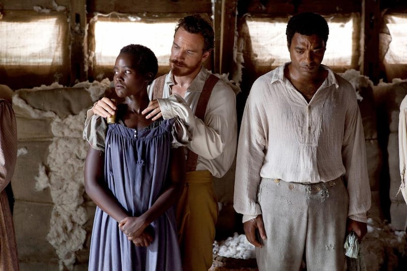 Lupita Nyong’o, left, Michael Fassbender and Chiwetel Ejiofor in a scene from 12 Years A Slave. Francois Duhamel / courtesy Fox Searchlight /AP 