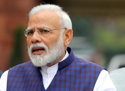 FILE PHOTO: FILE PHOTO: Indian Prime Minister Narendra Modi speaks to the media in New Delhi, India, November 18, 2019. REUTERS/Altaf Hussain/File Photo