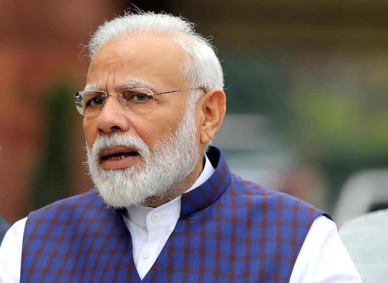 FILE PHOTO: FILE PHOTO: Indian Prime Minister Narendra Modi speaks to the media in New Delhi, India, November 18, 2019. REUTERS/Altaf Hussain/File Photo