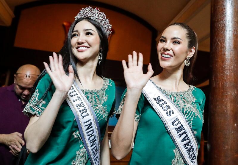 Miss Universe 2018 Catriona Gray of the Philippines (R) accompanied by Miss Indonesia 2018 Sonia Fergina Citra (C) wave during a visit to the Taman Sari Royal Haritage spa in Jakarta, Indonesia. Catriona Gray is visiting Jakarta to attend the grand final of the Putri Indonesia beauty pageant 2019.  EPA