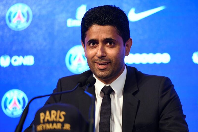 Paris Saint Germain's (PSG) Qatari president Nasser Al-Khelaifi speaks during a press conference to present Brazilian superstar Neymar at the Parc des Princes stadium on August 4, 2017 in Paris after agreeing a five-year contract following his world record 222 million euro ($260 million) transfer from Barcelona to PSG.
Paris Saint-Germain have signed Brazilian forward Neymar from Barcelona for a world-record transfer fee of 222 million euros (around $264 million), more than doubling the previous record. Neymar said he came to Paris Saint-Germain for a "bigger challenge" in his first public comments since arriving in the French capital. / AFP PHOTO / Lionel BONAVENTURE