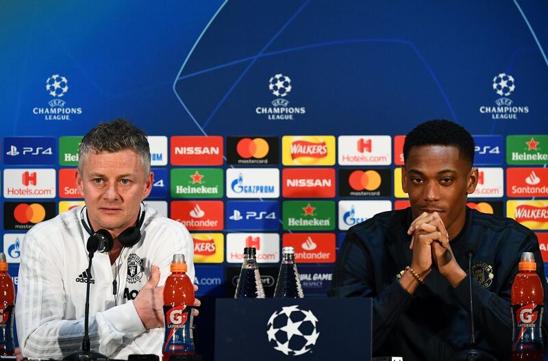 Manchester United's  Norwegian caretaker manager Ole Gunnar Solskjaer (L) and Manchester United's French striker Anthony Martial attend a press conference at Old Trafford in Manchester, north west England, on February 11, 2019, on the eve the first leg of their UEFA Champions League football match against Paris Saint-Germain. / AFP / FRANCK FIFE

