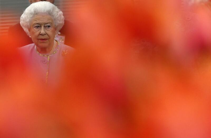 Britain’s Queen Elizabeth II looks at a display during a visit to the Chelsea Flower Show in London, Britain. The flower exhibition will run from 20 to 24 May. Stefan Wermuth / EPA