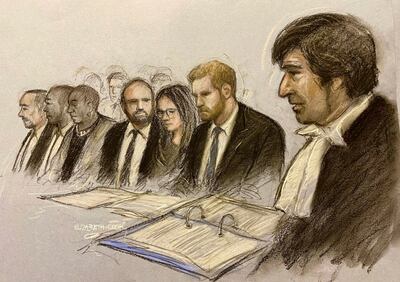 Prince Harry, second right, in court at the Royal Courts Of Justice. AP
