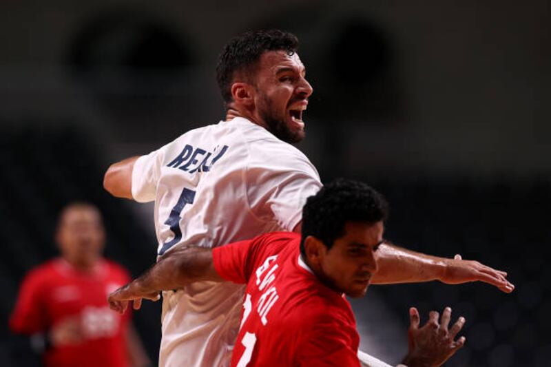 Nedim Remili of Team France challenges Omar Elwakil of Team Egypt.