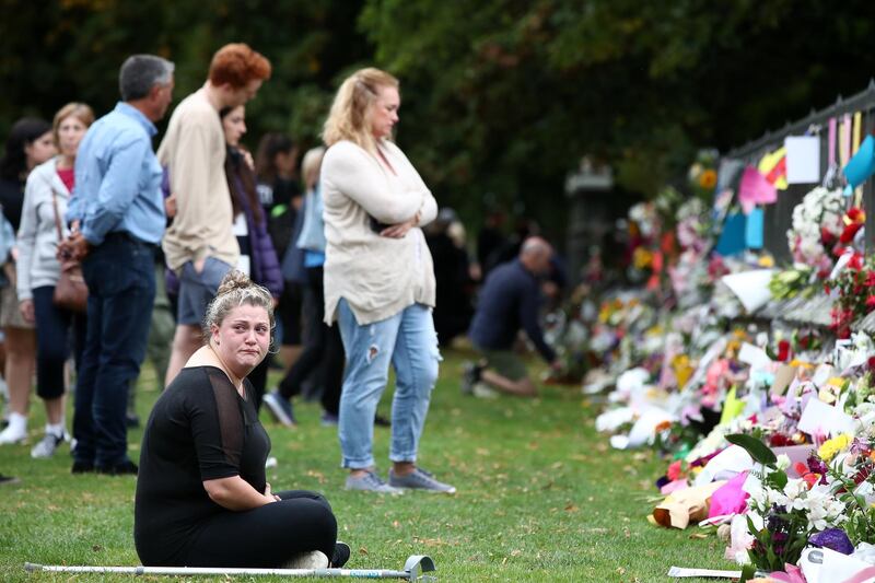 CHRISTCHURCH, NEW ZEALAND - MARCH 16: Locals continue to leave messages and flowers for the victims outside the Botanic Gardens on March 16, 2019 in Christchurch, New Zealand. At least 49 people are confirmed dead, with more than 40 people injured following attacks on two mosques in Christchurch on Friday afternoon. 41 of the victims were killed at Al Noor mosque on Deans Avenue and seven died at Linwood mosque. Another victim died later in Christchurch hospital. Three people are in custody over the mass shootings. One man has been charged with murder.  (Photo by Fiona Goodall/Getty Images)