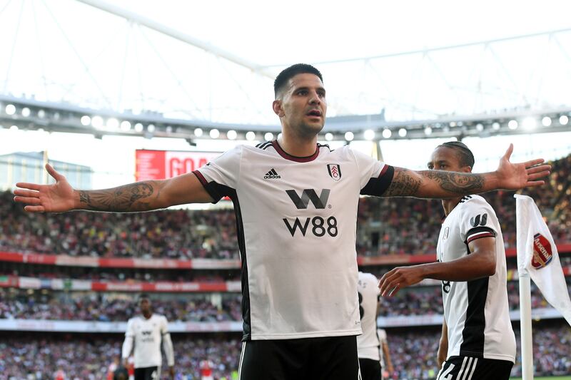 Fulham's Aleksandar Mitrovic celebrates after scoring against Arsenal. EPA