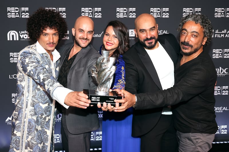 From left, Ahmed Zitouni, director Damien Ounouri, Imen Nel, Tahar Zaoui and Fouad Trifi with the award for Best Actress presented to Adila Bendimerad 