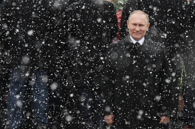 Putin attends a wreath laying ceremony at the Tomb of the Unknown Soldier by the Kremlin wall on February 23, 2017. AFP