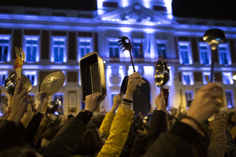 Women rise kitchen utensils. Spain marks International Women's Day with a women's general strike and countless protests scheduled throughout the day across the country in defence of their rights. Getty Images