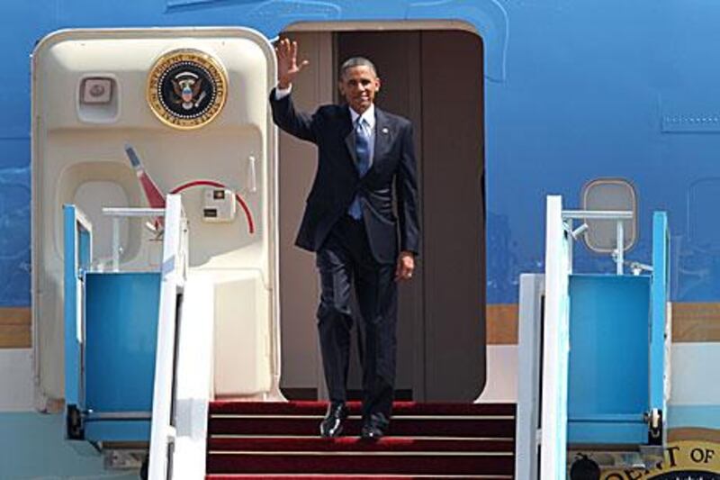 US President Barack Obama waves on his arrival in Israel at Ben Gurion Airport today.