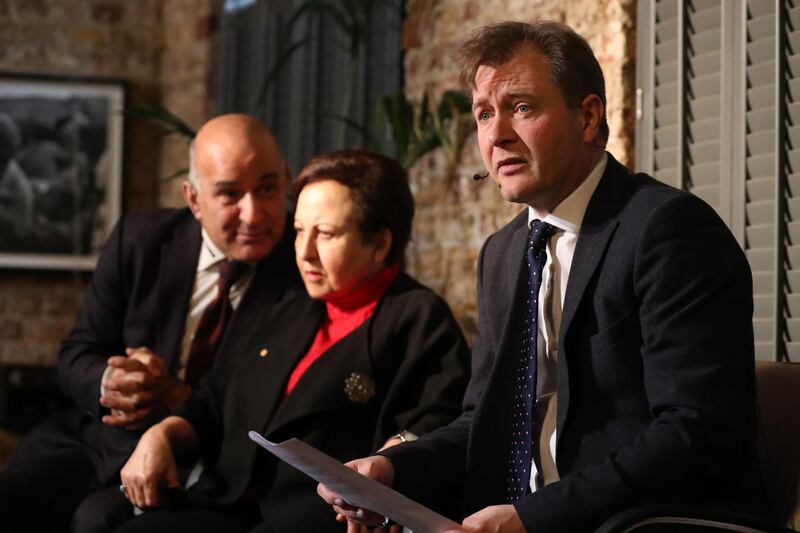 Richard Ratcliffe (R), husband of jailed British-Iranian Nazanin Zaghari-Ratcliffe and Nobel Laureate Iran's Shirin Ebadi (C) take part in a joint press conference in London to mark the start of Nazanin Zaghari-Ratcliffe's hunger strike in Tehran's Evin prison on January 14, 2019.

 / AFP / Daniel LEAL-OLIVAS
