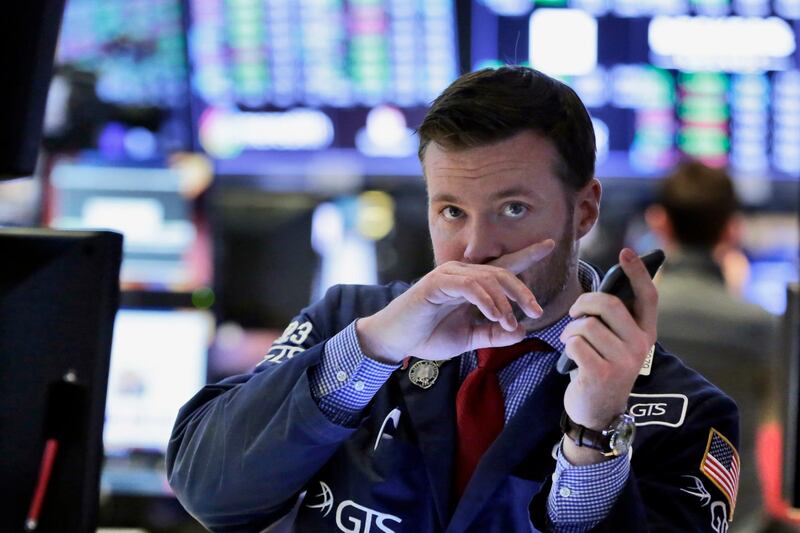 Trader Frank Masiello works on the floor of the New York Stock Exchange, Friday, Feb. 9, 2018. Stocks staged a late rally Friday, ending a wild week marked by dramatic point swings on a positive note. (AP Photo/Richard Drew)