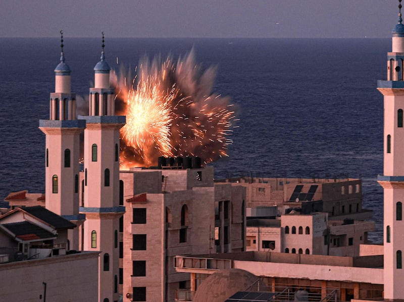 A fireball erupts from an Israeli air strike in Gaza city. AFP