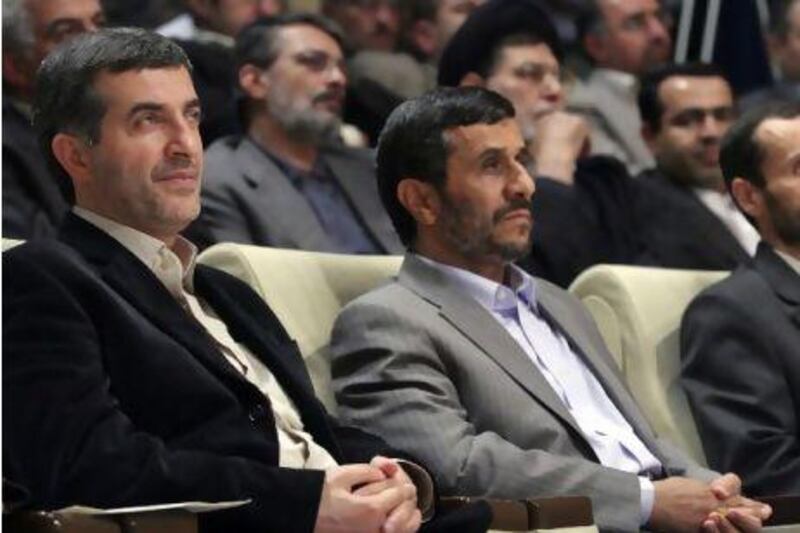 Iran's President Mahmoud Ahmadinejad (right) and first vice-president Esfandiar Rahim Mashaei: Mr  Mashaie has been accused of putting the president under a spell.
