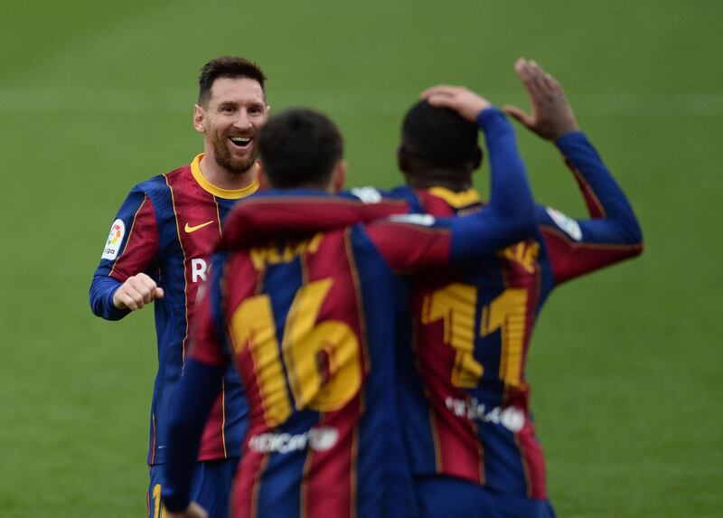 Lionel Messi congratulates Ousmane Dembele after his goal. AFP