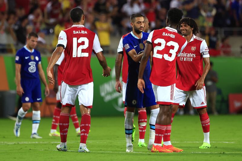 Chelsea winger Hakim Ziyech hakes hands with Albert Sambi Lokonga of Arsenal following the Florida Cup match. Getty
