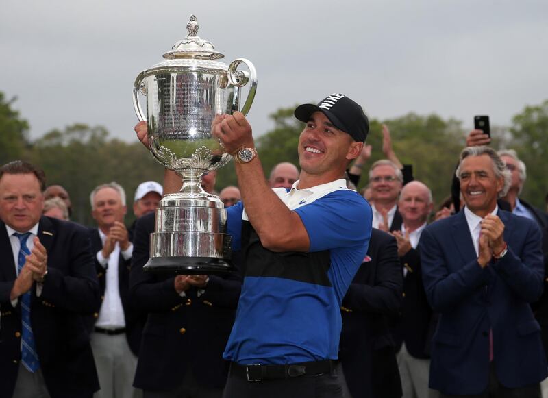 Brooks Koepka celebrates with the Wanamaker Trophy after winning the PGA Championship. USA Today