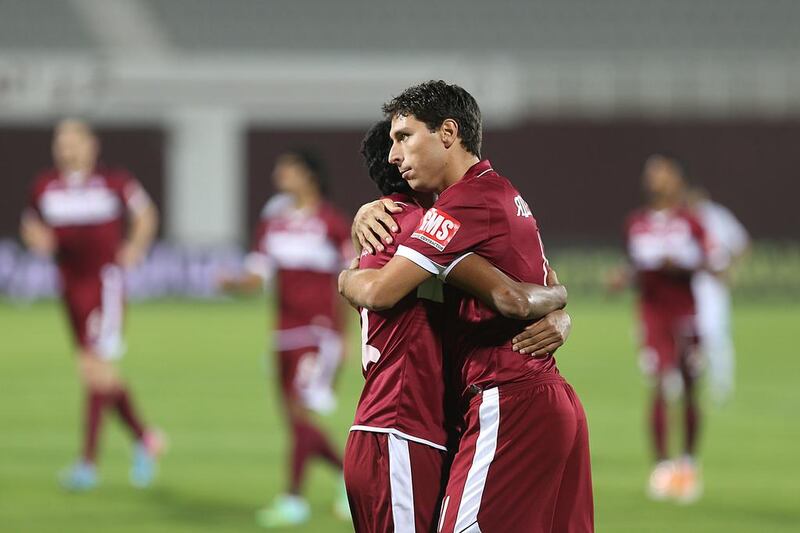 Al Wahda's Sebastian Tagliabue, right, netted two goals on Tuesday night to lift his team to a 3-2 win over Baniyas. Delores Johnson / The National