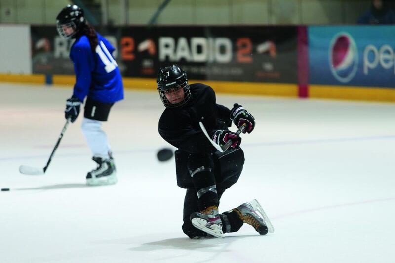 Fatima Al Ali in action for the Abu Dhabi Storms ice hockey team. The 24-year-old Emirati was a photographer for the UAE Ice Hockey Federation and Abu Dhabi Ice Sports Club, before strapping on her skates to play. Christopher Pike / The National