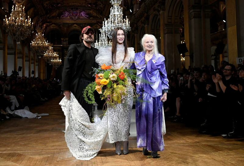 From left, Kronthaler, model Bella Hadid and Westwood after the designer's autumn/winter show in Paris in 2020. Reuters