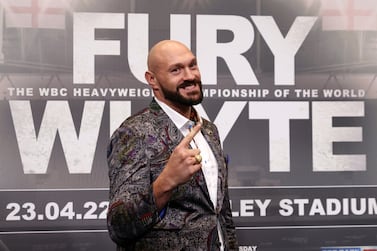 LONDON, ENGLAND - MARCH 01: Tyson Fury gestures during the Tyson Fury v Dillian Whyte press conference at Wembley Stadium on March 01, 2022 in London, England. (Photo by James Chance / Getty Images)
