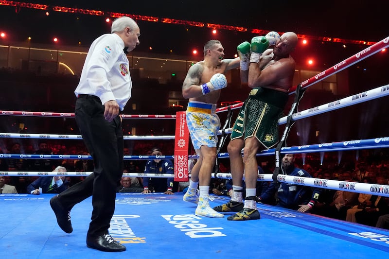 Oleksandr Usyk goes on the attack after rocking Tyson Fury in the ninth round. PA