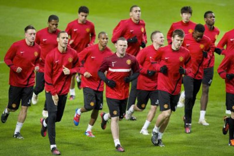 epa03107563 The players of Manchester United during the training in Amsterdam, The Netherlands, 15 February 2012. Manchester United will play a UEFA Europa League match tomorrow against Ajax Amsterdam in the Amsterdam Arena.  EPA/Olaf Kraak *** Local Caption ***  03107563.jpg