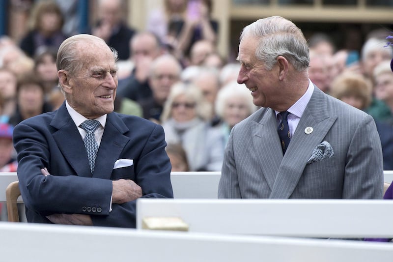POUNDBURY, ENGLAND - OCTOBER 27: Britain's Prince Philip, Duke of Edinburgh (L) and Prince Charles, Prince of Wales (R) listen to speeches before a statue of the Queen Elizabeth, The Queen Mother was unveiled on October 27, 2016 in Poundbury, England.
The Queen and The Duke of Edinburgh, accompanied by The Prince of Wales and The Duchess of Cornwall, visited Poundbury. Poundbury is an experimental new town on the outskirts of Dorchester in southwest England designed by Leon Krier with traditional urban principles championed by The Prince of Wales and built on land owned by the Duchy of Cornwall.(Photo by Justin Tallis - WPA Pool/Getty Images)