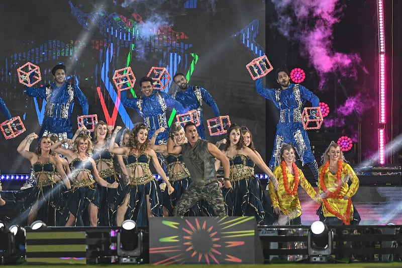 Bollywood actor Akshay Kumar, centre, performs during the opening ceremony. AFP