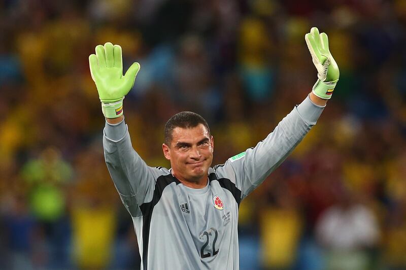 CUIABA, BRAZIL - JUNE 24:  Goalkeeper Faryd Mondragon of Colombia acknowledges the fans after the 2014 FIFA World Cup Brazil Group C match between Japan and Colombia at Arena Pantanal on June 24, 2014 in Cuiaba, Brazil.  (Photo by Mark Kolbe/Getty Images)