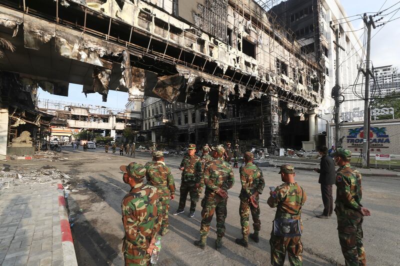 Cambodian military personnel stand guard near the hotel. AP Photo